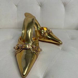 Gold high-heeled